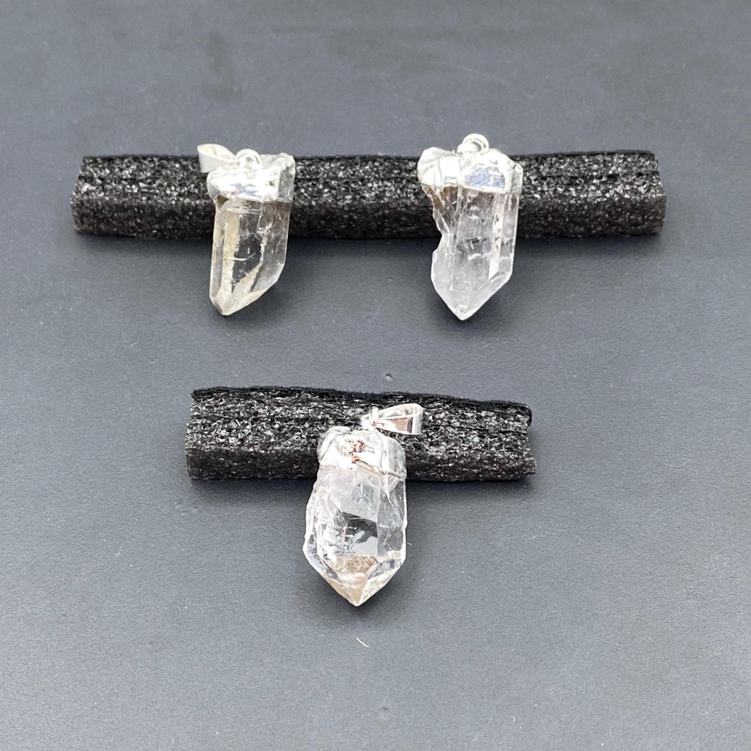 Translucent Riber Quartz Clear Quartz Small Raw Point Silver Pendant – Crystal River Gems