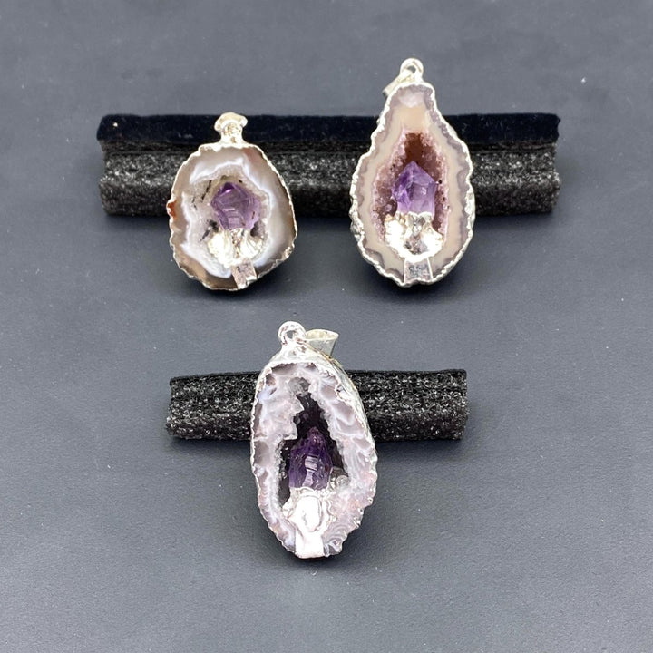 Oco Half Geode Silver Pendant with Amethyst PointCrystal River Gems