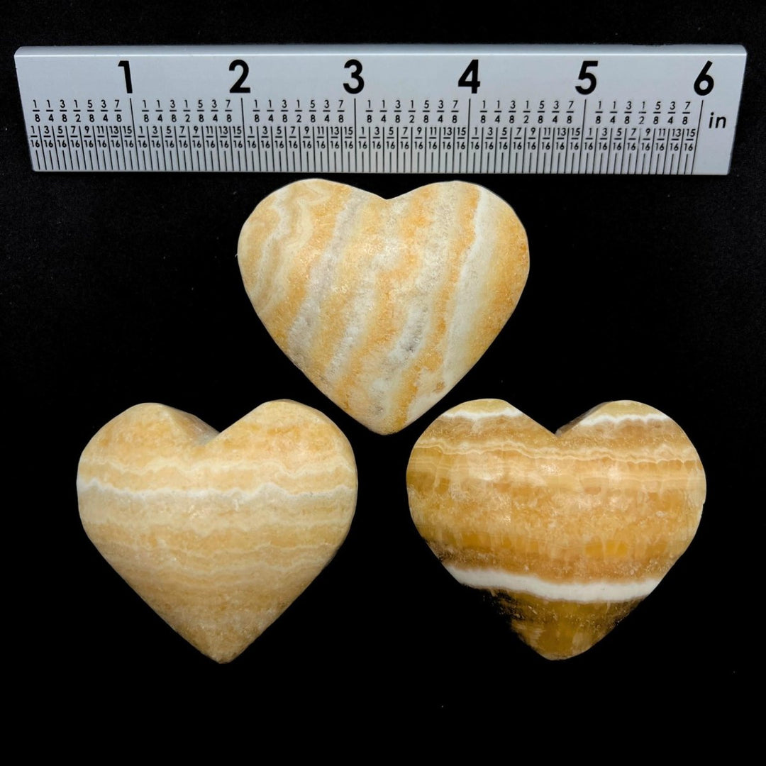 Yellow Banded Calcite Polished HeartsCrystal River Gems