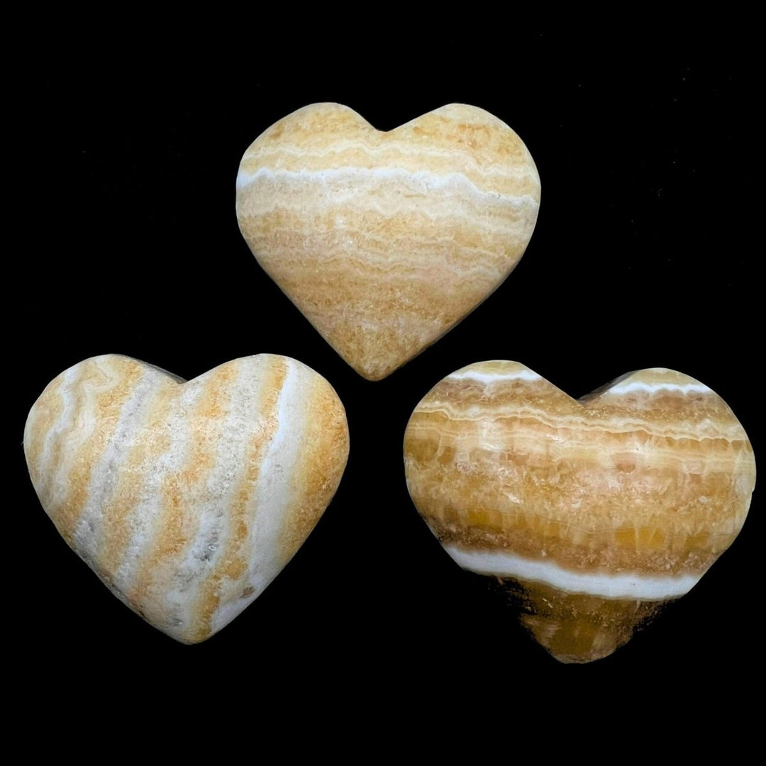Yellow Banded Calcite Polished HeartsCrystal River Gems
