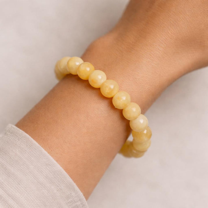 Yellow Calcite Round Bead Stretch Bracelet (8 mm)Crystal River Gems